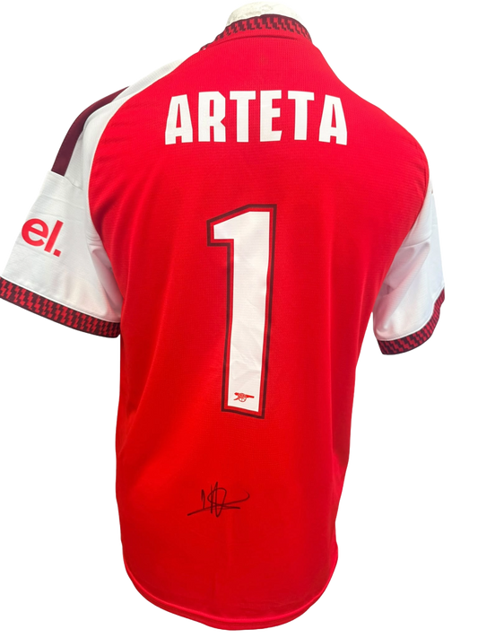 Back view of a 2026/27 Arsenal home shirt hand-signed in permanent marker by manager Mikel Arteta.
