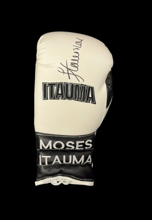 Official boxing glove hand-signed by British heavyweight prospect Moses Itauma, featuring a clear black ink autograph on a high-quality red and white glove.