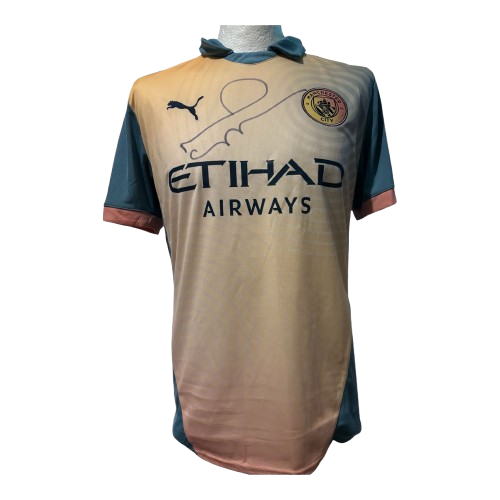 Authentic hand-signed Noel Gallagher Manchester City "Definitely Maybe" fourth shirt with bold autograph.