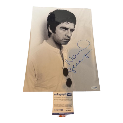 Authentic hand-signed Noel Gallagher photo portrait with a clear signature and certificate of authenticity.