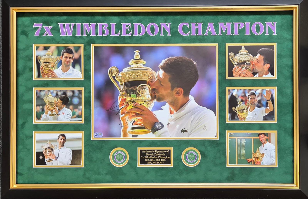 Novak Djokovic signed Wimbledon photo montage featuring central trophy kissing photo, 6 career photos, and 7x Wimbledon Champion plaque.