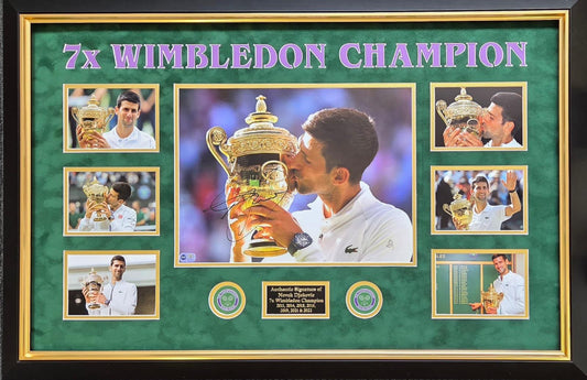 Novak Djokovic signed Wimbledon photo montage featuring central trophy kissing photo, 6 career photos, and 7x Wimbledon Champion plaque.