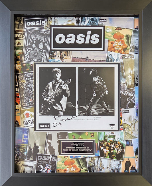 Oasis signed photo frame dual signed by Noel and Liam Gallagher with the band logo, bespoke plaque, and background collage imagery.