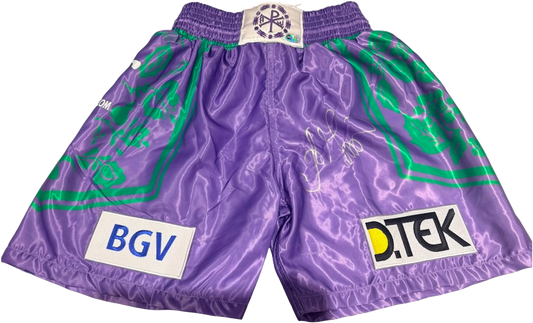 Oleksandr Usyk hand signed boxing shorts in a striking purple and green colour scheme with a bold silver autograph.