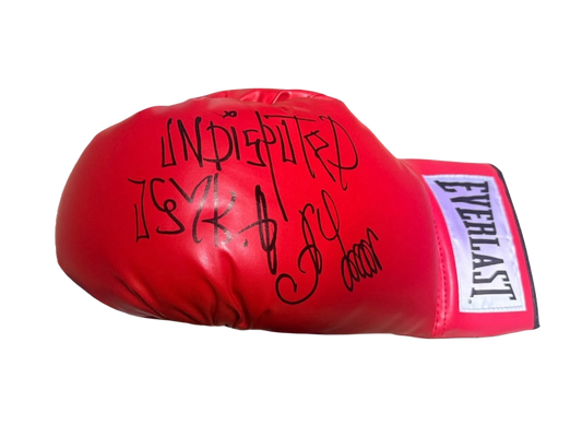 Close up view of a signed Oleksandr Usyk boxing glove featuring a large hand-signed autograph and Undisputed Usyk inscription on the main strike surface