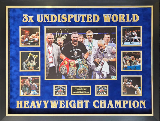 Authentic Oleksandr Usyk hand-signed photo montage celebrating his undisputed championship status with a gold autograph on the main image.