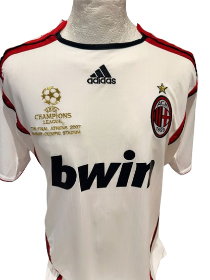 Official 2006/07 AC Milan home shirt with Athens 2007 embroidery hand-signed by Paolo Maldini in bold permanent ink.