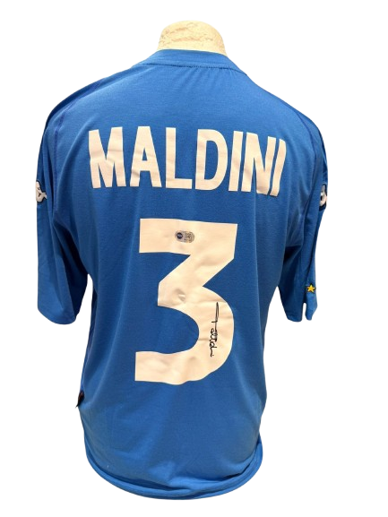 Classic azure blue Italy home shirt hand-signed by Paolo Maldini in bold permanent ink.