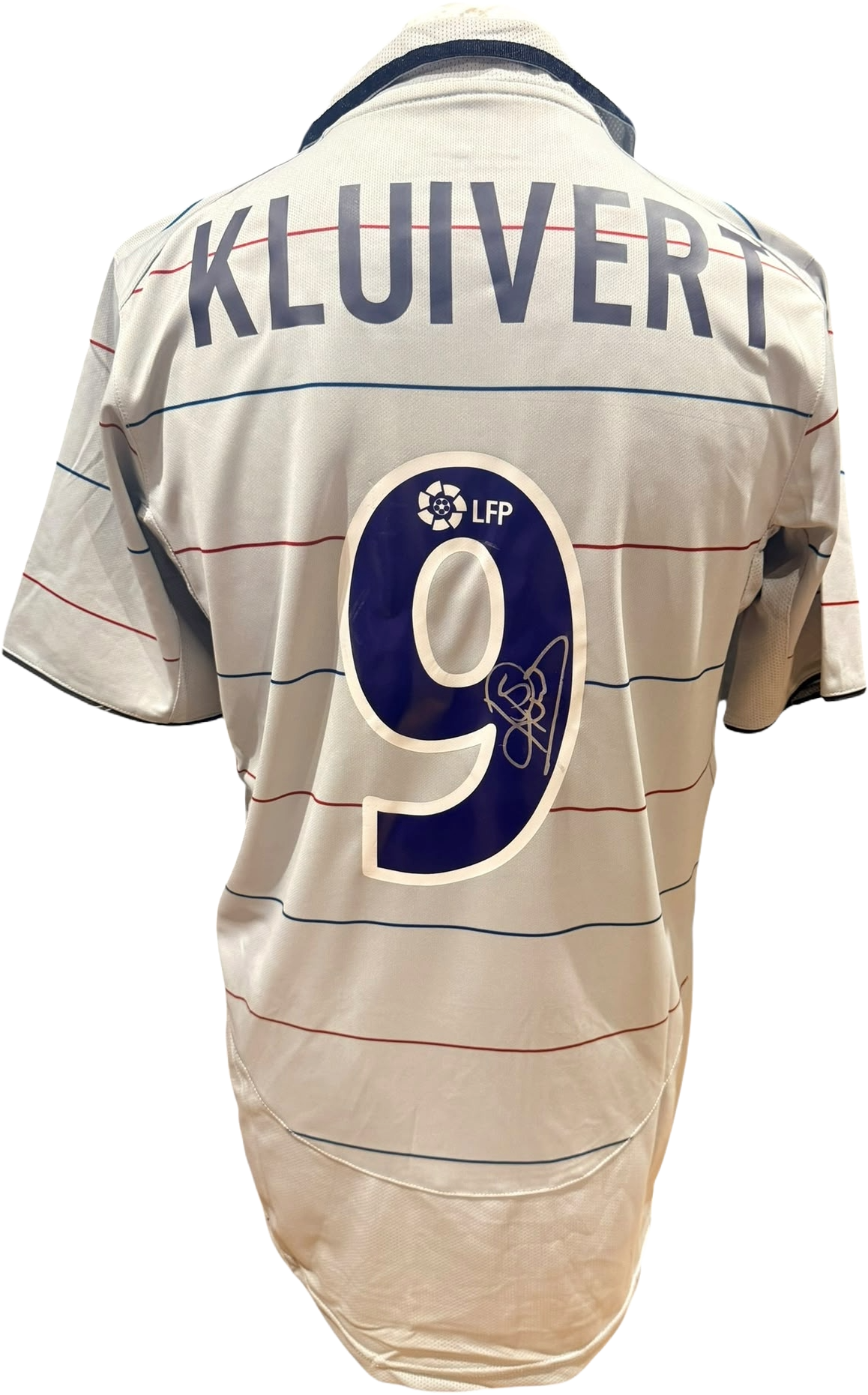 Rear view of a replica retro Barcelona away shirt hand-signed by striker Patrick Kluivert, displayed alongside the Certificate of Authenticity.
