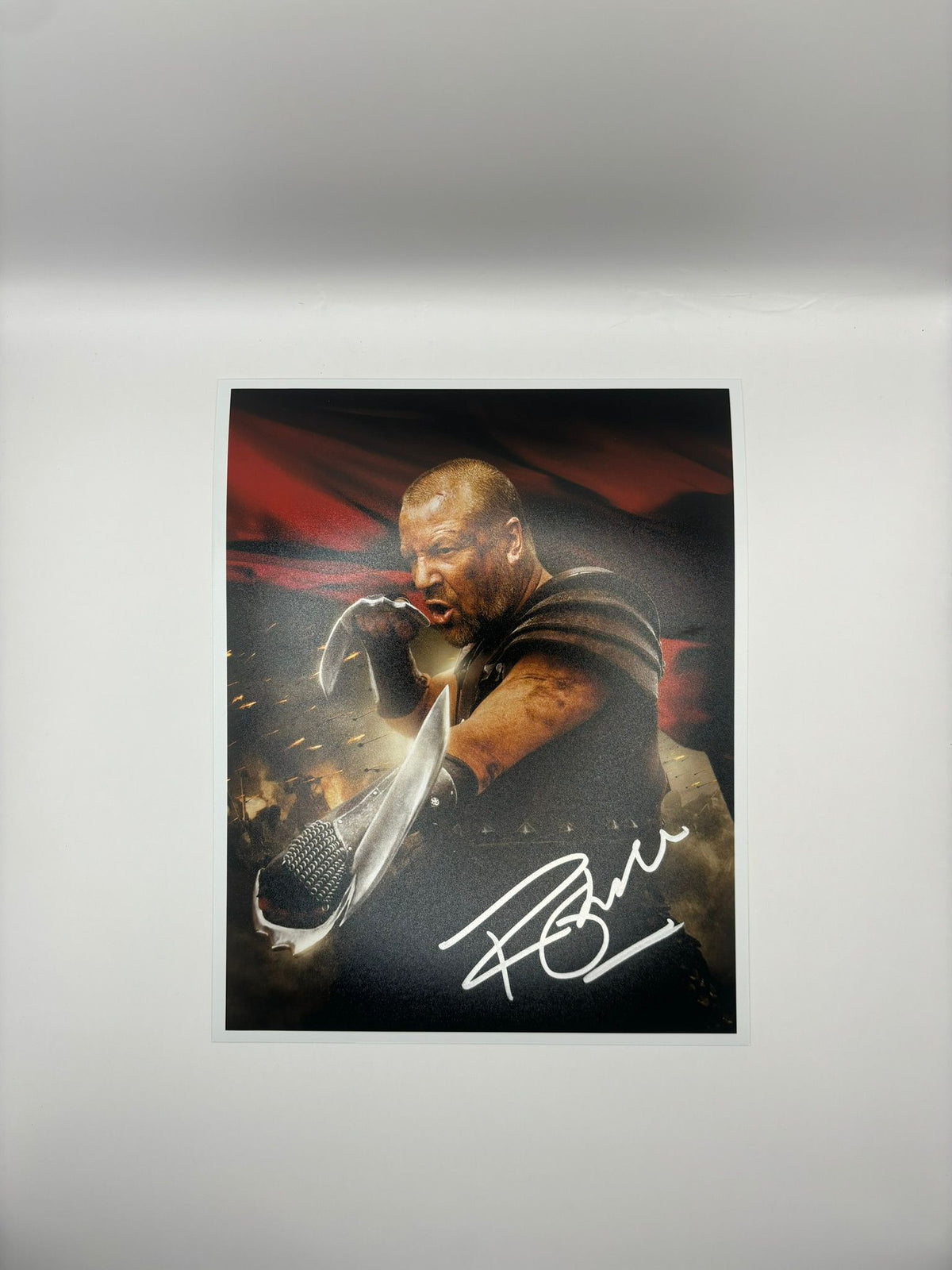 Authentic high-gloss photograph of Ray Winstone as Bors in King Arthur, hand-signed by the actor in bold permanent ink with an official Limelight Memorabilia COA.