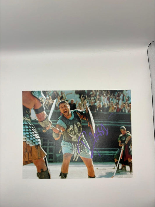 Authentic high-gloss 8x10 photograph of Russell Crowe as Maximus in Gladiator, hand-signed by the actor in bold permanent ink with an official Limelight Memorabilia COA.