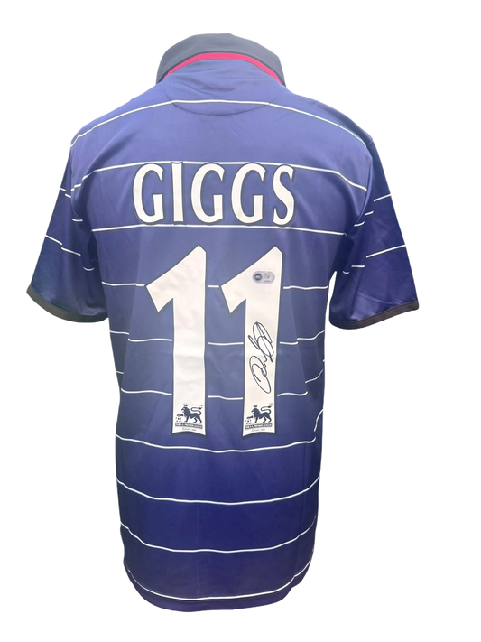 Back view of a blue 1999/2000 Manchester United away shirt hand-signed directly on the squad number by Ryan Giggs.