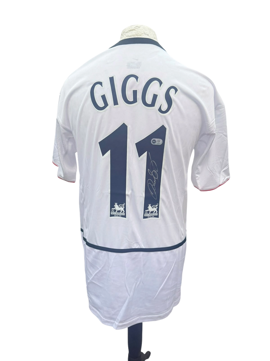 Back view of a white 2002/03 Manchester United away shirt hand-signed directly on the squad number by Ryan Giggs.