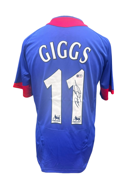 Back view of a blue 2005/06 Manchester United away shirt hand-signed directly on the squad number by Ryan Giggs.