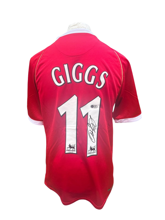 Back view of a red 2006/07 Manchester United home shirt hand-signed directly on the squad number by Ryan Giggs.