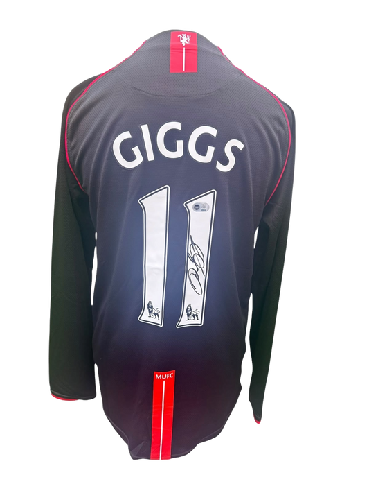 Back view of a black 2007/08 Manchester United away shirt hand-signed directly on the squad number by Ryan Giggs.