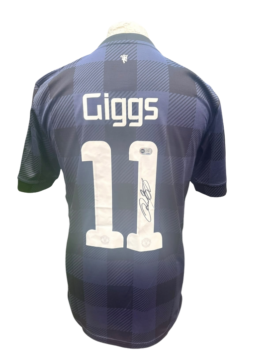Back view of a 2013/14 Manchester United away shirt hand-signed directly on the squad number by Ryan Giggs.