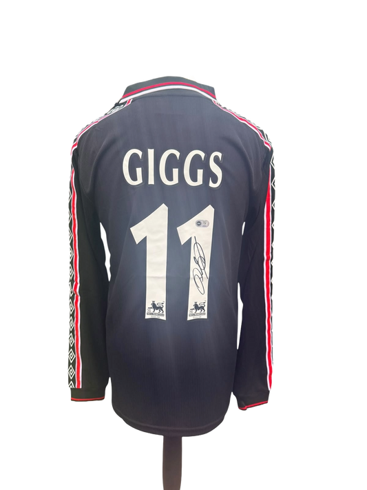Back view of a special edition black 1998/99 Manchester United shirt signed directly on the squad number by Ryan Giggs.