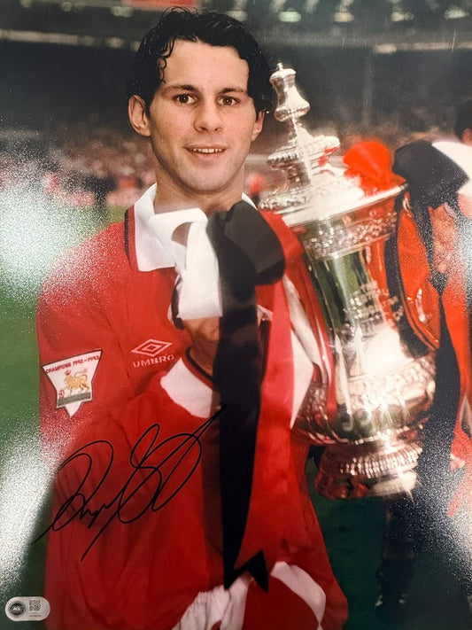 Ryan Giggs celebrating the 1994 FA Cup final victory at Wembley, hand-signed in permanent marker.