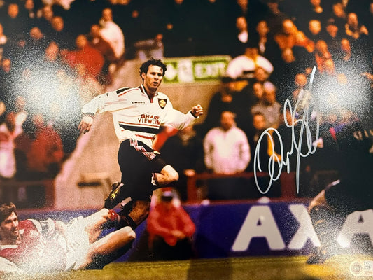 Ryan Giggs scoring his legendary solo goal against Arsenal in the 1999 FA Cup semi-final replay at Villa Park, hand-signed in permanent marker.