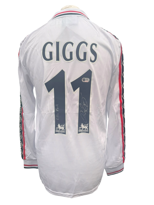 Back view of a special edition white 1998/99 Manchester United shirt hand-signed directly on the squad number by Ryan Giggs.