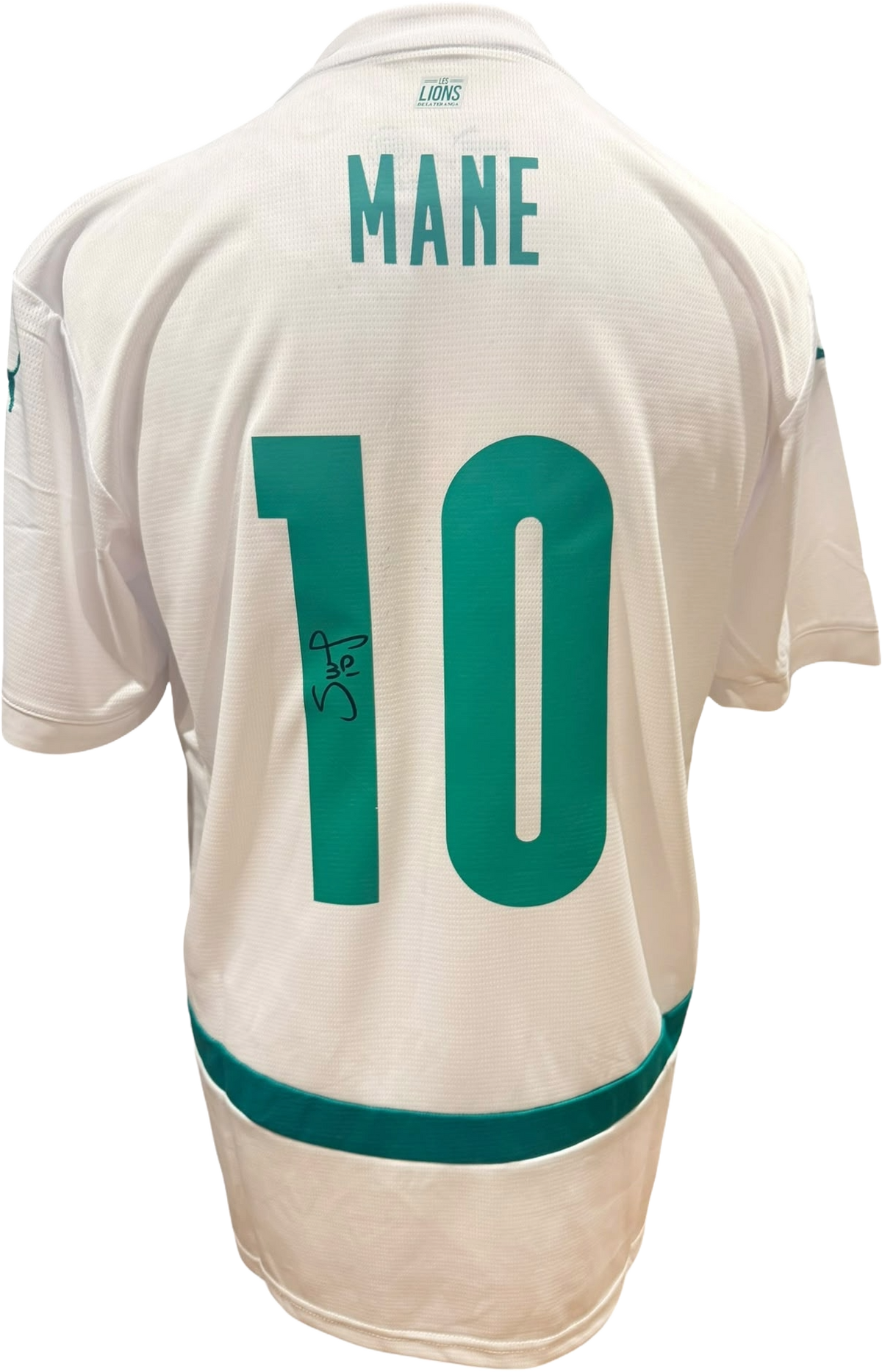 Rear view of a replica Senegal home shirt hand-signed by winger Sadio Mane, displayed alongside the Certificate of Authenticity.