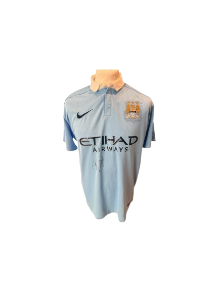 Official sky blue Manchester City shirt hand-signed by Shaun Wright-Phillips in bold permanent ink.