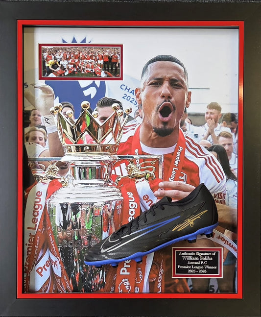 A premium three-dimensional framed display featuring a hand-signed William Saliba football boot alongside a large matchday photo, one photo inset, and a bespoke brass plaque.