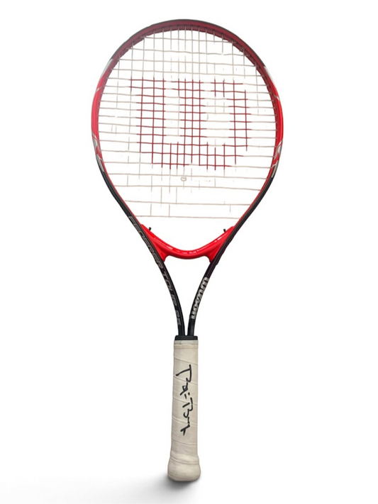 Full view of the signed Björn Borg tennis racket showcasing the hand-signed autograph clearly across the handle grip