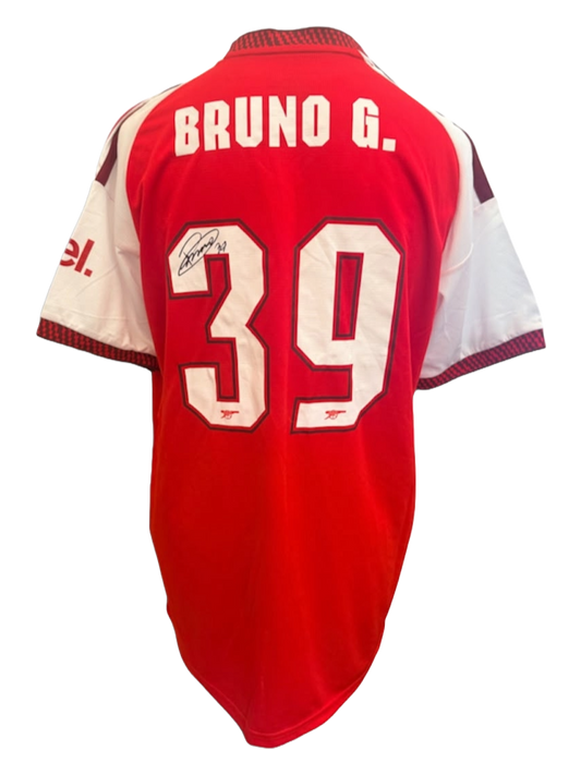 Back view of the signed Bruno Guimarães Arsenal home shirt 2026/27 featuring custom club font and autograph across the rear number