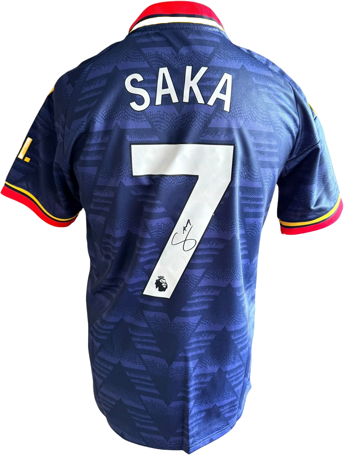 Authentic hand-signed Bukayo Saka Arsenal blue bruised banana away jersey from the 2026/27 season featuring a clear signature on the back.