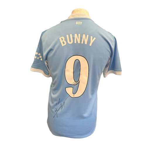Back view of the signed Bunny Shaw Manchester City Women home shirt 2026/27 displaying a large hand-signed autograph next to the squad number