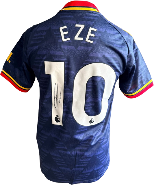 Authentic hand-signed Eberechi Eze Arsenal blue bruised banana away jersey from the 2026/27 season featuring a clear signature on the front.