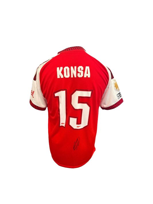 Back view of the signed Ezri Konsa Arsenal home shirt 2026/27 with club font printing showing player autograph