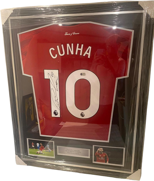 Professionally framed and authentic hand-signed Matheus Cunha Manchester United home jersey featuring a large signature across the back shirt number.