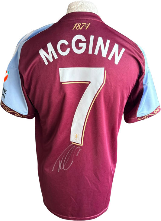 Authentic hand-signed John McGinn Aston Villa home jersey from the 2025/26 season featuring a clear signature on the back.