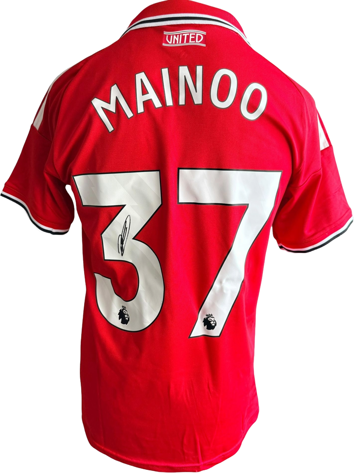 Authentic hand-signed Kobbie Mainoo Manchester United home jersey from the 2026/27 season featuring a clear signature on the front.