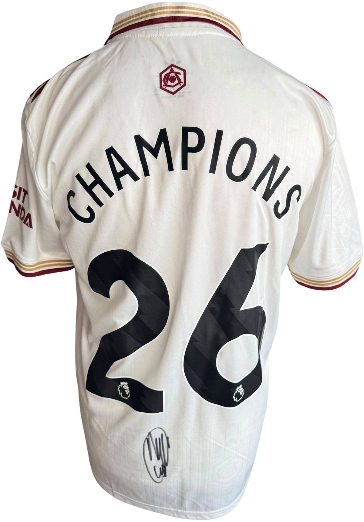 Authentic hand-signed Myles Lewis-Skelly Arsenal third jersey featuring Champions 26 custom printing and a clear signature on the back.