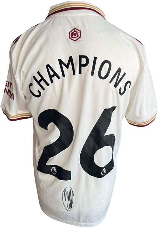 Authentic hand-signed Myles Lewis-Skelly Arsenal third jersey featuring Champions 26 custom printing and a clear signature on the back.