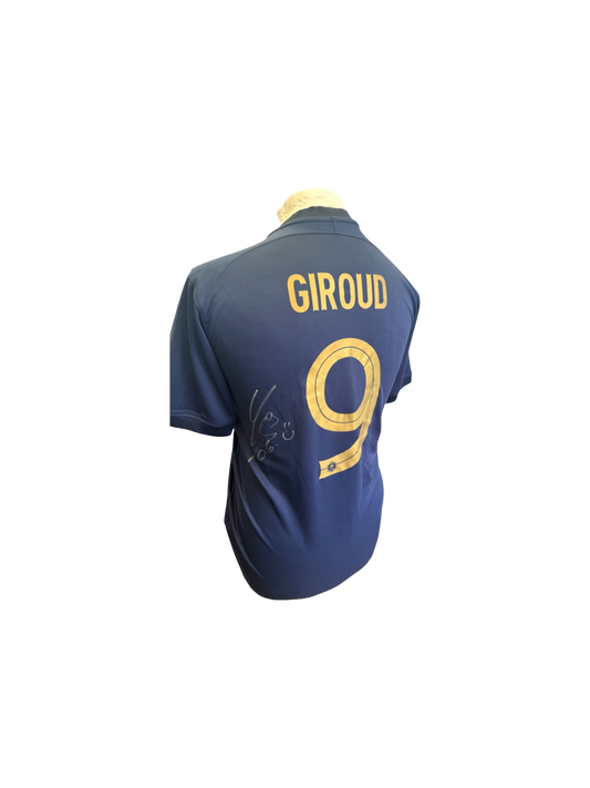 Close up angle showing the Olivier Giroud signature in silver marker on the France shirt