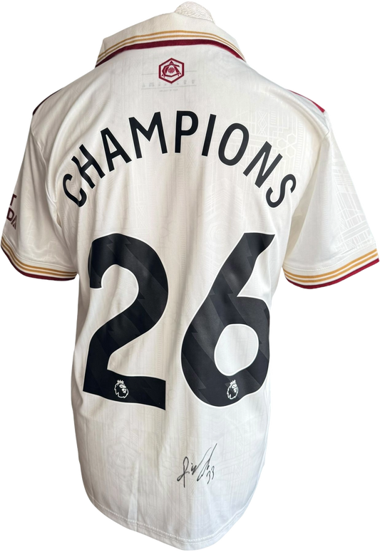 Authentic hand-signed Riccardo Calafiori Arsenal third jersey featuring Champions 26 custom printing and a clear signature on the back.