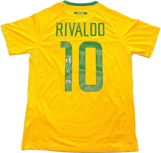 Hand-signed yellow Brazil football jersey featuring a bold authentic autograph on the back by legend Rivaldo.