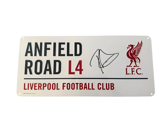 Front view of an enamel Anfield Road Liverpool street sign hand-signed in permanent marker by Ronald Araujo.