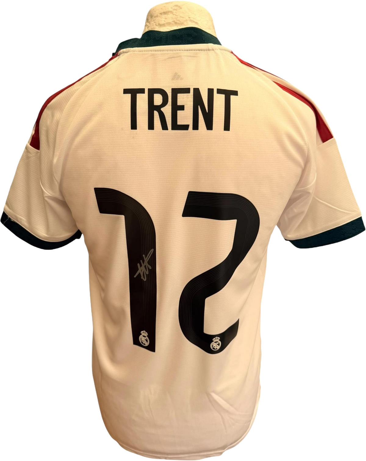 A clear signature hand-signed by Trent Alexander Arnold across the front of the white Real Madrid 2026/27 home shirt.