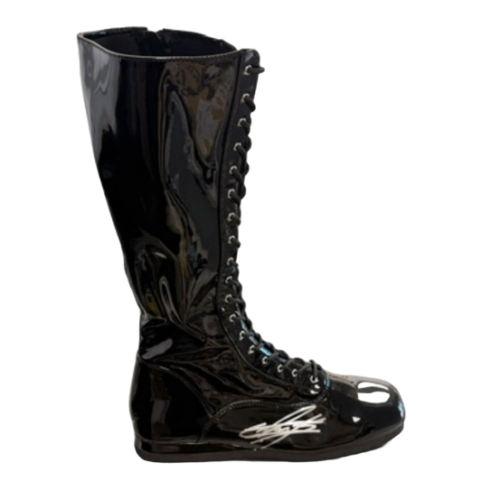 Black wrestling boot hand-signed by WWE legend The Undertaker in silver marker