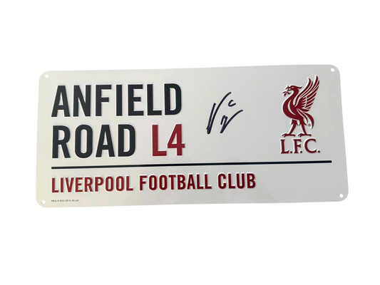 Front view of an enamel Anfield Road Liverpool street sign hand-signed in permanent marker by Víctor Muñoz.