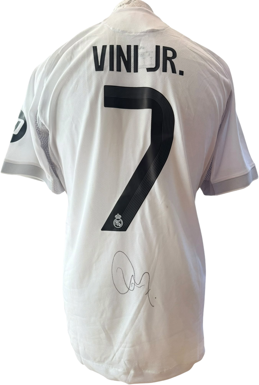 Unframed hand-signed Vini Jr Real Madrid 2025/26 home shirt showcasing the clean autograph on the reverse.