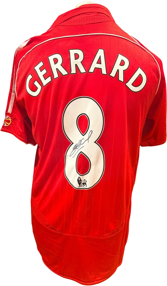 Rear view of a 2006-08 replica Liverpool home shirt hand-signed by captain Steven Gerrard, displayed alongside the Certificate of Authenticity.