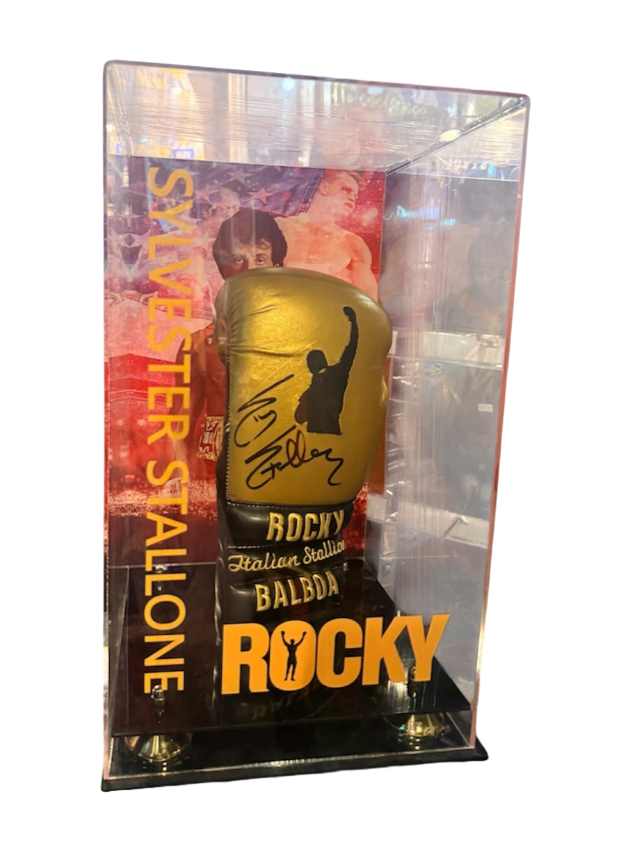Signed Sylvester Stallone metallic gold Rocky boxing glove housed inside a custom acrylic display case, featuring a bold hand-signed autograph across the wrist