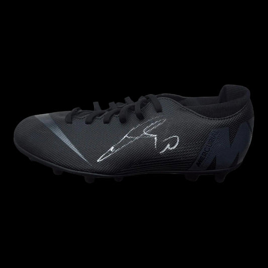 A professional-grade football boot hand-signed by Thorgan Hazard in bold permanent ink on the side, featuring an official Limelight Memorabilia COA.